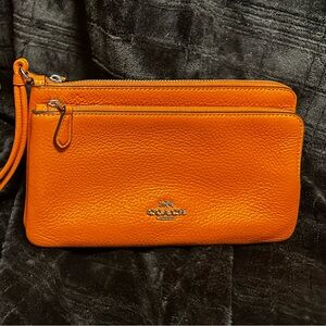 Coach leather wristlet/clutch.